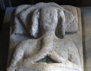 The Fair Maid of Normanton This weathered stone burial effigy located in the NW corner of the south aisle at St Mary's is popularly known as the Fair Maid of Normanton. It originally lay outside the church, and may have originated from the old church in Normanton, but nobody knows for certain. | Neil Fortey, 10th April 2012
