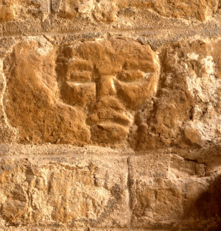 The face carved in the stones of the church porch The crude face, a piece of 'folk art' carved in the stones on the inside of the church porch at St Mary's. | Neil Fortey, 21/4/2014