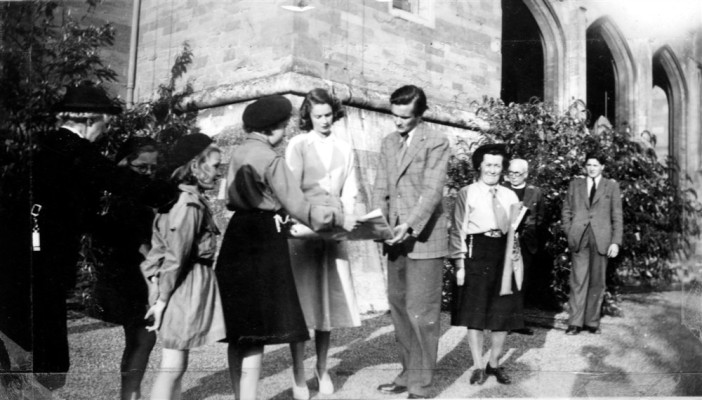 Duke and Duchess of Rutland presenting a scroll to the Guides