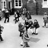 Children playing in the school yard in 1975