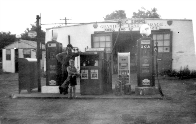 Eric Simms and son outside the garage on Grantham Road Eric Simms and son outside the garage on Grantham Road
