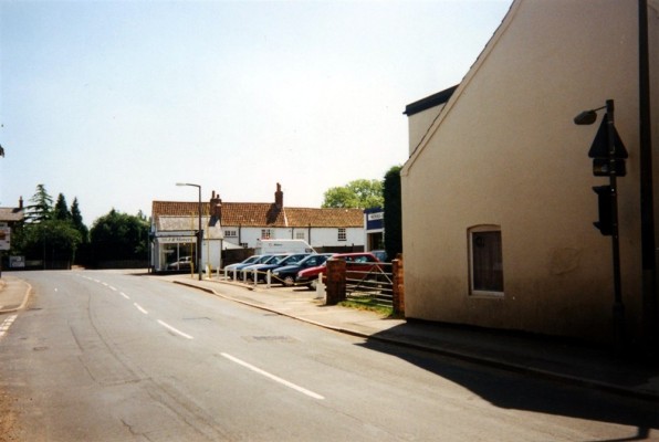 Snap shot of Nichols Car Sales and the Mower Shop on the High Street