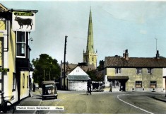 An old postcard of Bottesford Market Place and Cross