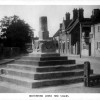 old postcard of Bottesford Market Cross and Stocks
