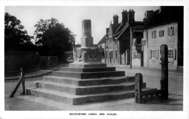 old postcard of Bottesford Market Cross and Stocks