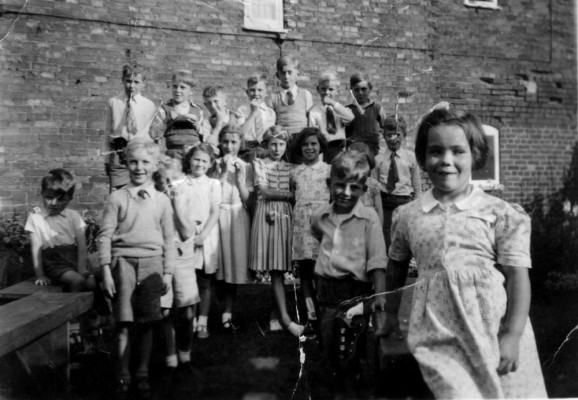 Photo of children in yard Photo of children in yard