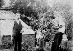Old picture of the Samuel family in vegetable plot