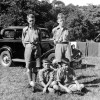 Scouts on camp, car in background