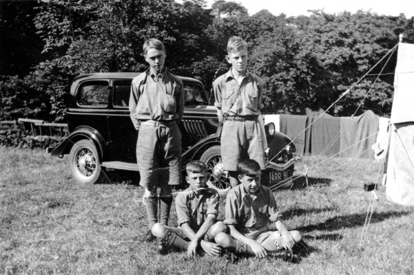Scouts on camp, car in background Scouts on camp, car in background