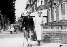 Two elderly ladies strolling through Skegness