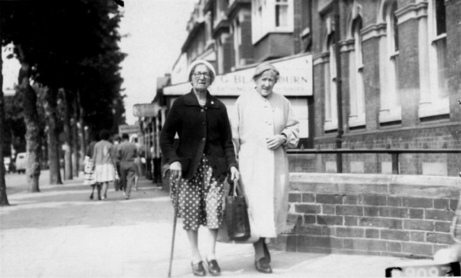 Two elderly ladies strolling through Skegness
