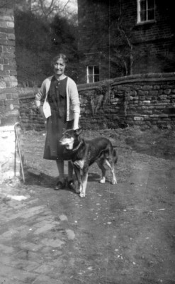 Mrs Bateson with dog in Six Bells yard Mrs Bateson with dog in Six Bells yard