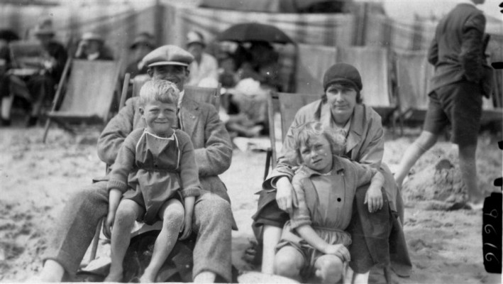 family in deck chairs on beach at Skegness family in deck chairs on beach at Skegness