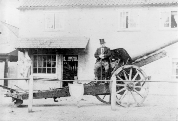 German gun in front of Taylor's shop