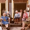 colour picture of elderly group in deckchairs at seaside