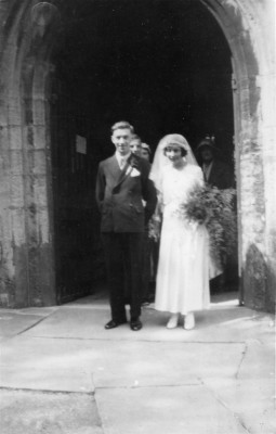 wedding, couple emerging from west door of church
