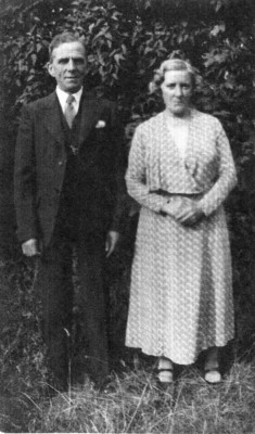elderly couple in a garden