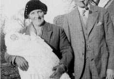picture of grandparents holding new grandchild