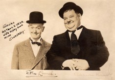 Signed souvenir postcard of Laurel and Hardy