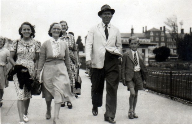Michael (right) with the family on holiday at the seaside