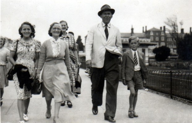 Michael (right) with the family on holiday at the seaside Michael (right) with the family on holiday at the seaside