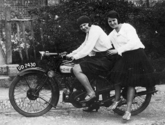 Mary and Margaret Topps trying out a motorbike