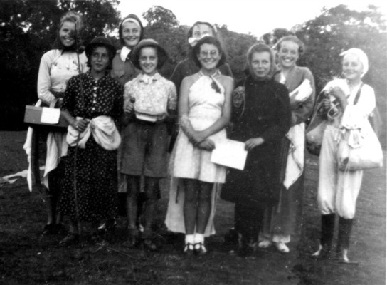 Girl Guides dressed up for a theatrical performance