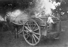 Wendy or Gina Topps on a cart in Daybell's farm yard Bottesford