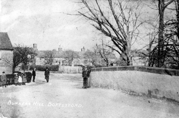 Old postcard of people on the Washdyke Bridge