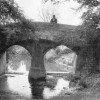 Postcard of man on Fleming's Bridge