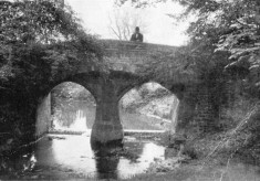 Postcard of man on Fleming's Bridge