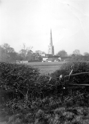 The church spire and Church Farm from Station Road