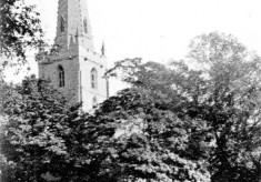 A postcard of Bottesford church spire