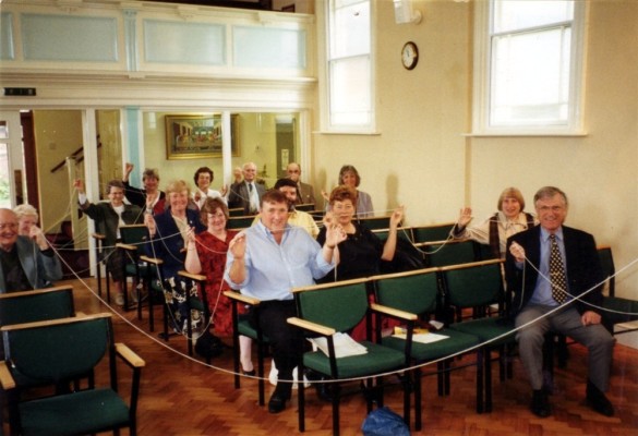 Members of the chapel trying out the new seating - 1