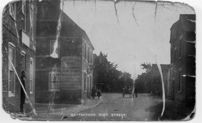 Old postcard of High Street and the Rutland Arms