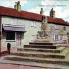 Old postcard, Cross and Stocks, Taylor's Butchers and Sutton's shop