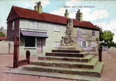 Old postcard, Cross and Stocks, Taylor's Butchers and Sutton's shop