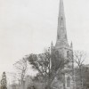Old postcard of Bottesford church spire seen from NW