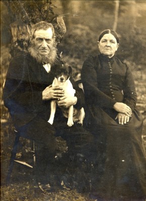 Old couple with dog, photographed before 1900