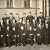 Group photograph, students and tutors, location uncertain