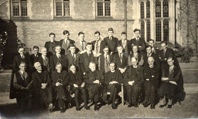 Group photograph, students and tutors, location uncertain
