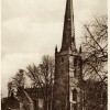 Old postcard of Bottesford church spire and old cottages
