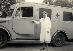 ambulance, nurse standing by passanger door