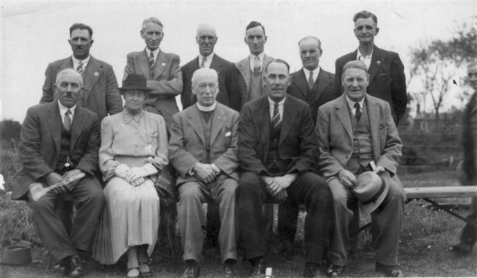 Canon Blackmore, seated, with others Canon Blackmore, seated, with others