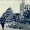 Bob Sutton walking past Bottesford Church