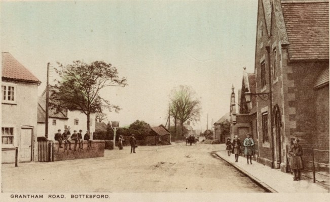 Grantham Road, Bottesford, with Red Lion on left and village school on right, old postcard