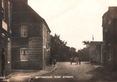 Postcard of the High Street and Rutland Arms