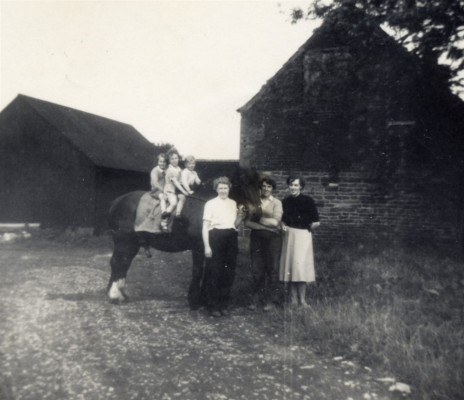 Calcraft family by the barns at Sykes Lane Farm, Muston Calcraft family by the barns at Sykes Lane Farm, Muston