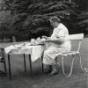 Mrs Blackmore taking tea in the Rectory garden