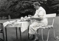 Mrs Blackmore taking tea in the Rectory garden